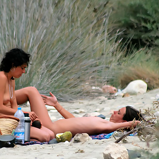 Naked Girls and Women Enjoy Being Captured on Camera While They Spread Their Legs at Naturist Beache