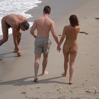 Yummy Naturist Wives and Their Lucky Husbands Relax in the Sun and Sand and Get a Little Frisky