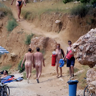 Sexy naturist girls open their legs on nude beaches to uncover their hairy and shaved pussies watch 