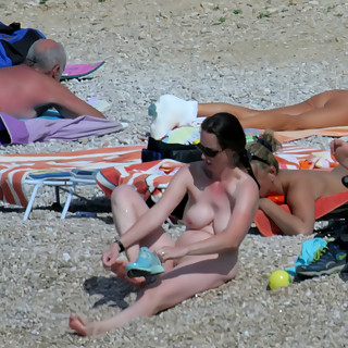 Enjoy Seeing Naked Babes at Naturist Beaches Sun Bathing Exposing Their Big Boobs and Letting Us See
