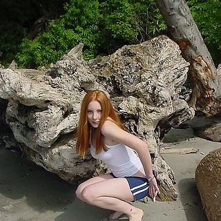 Teenage Redhead Babe is Pissing Outdoors then She Takes off Her Shorts to Reveal Us Her Hairy Pussy 