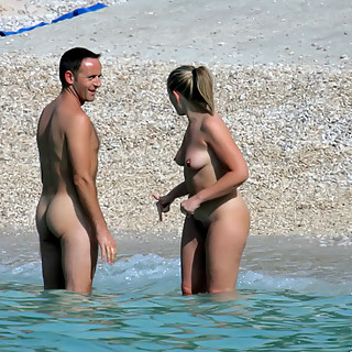 Nude Couples on Naturist Beaches and Resorts Exposing Their Naked Bodies and Spreading Legs for Puss