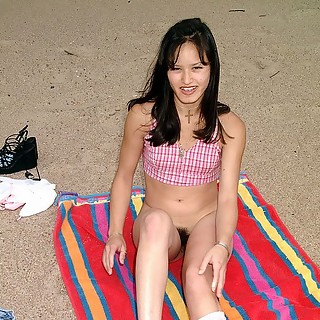 Hot Asian Teen Suddenly Spreads Her Hairy Pussy at Public Beach Where All People Watching Her She Do