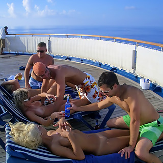 Hot Teen Girls Sunbathing on Nude Naturist Beaches and Their Boyfriends are Massaging Their Bodies w