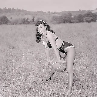 Beautiful Vintage Brunette with a Smile on Her Face as She Poses Outdoors in the Skimpiest Outfits P