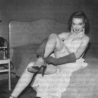 Series of Vintage Pornstar Photos of 1950s Featuring Leggy Naked Blonde with Perky Nipples and Fishn