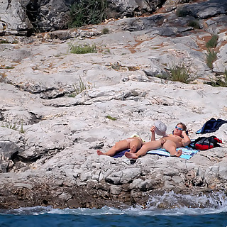 We Found a Woman Peeing into Sea at Naturist Beach and Lots of other Nude Chicks with Big Boobs Star
