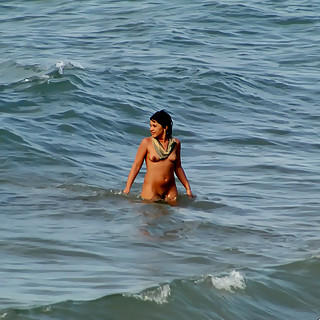Nude Couples and Girls Enjoy Their Time on Naturist Beaches Where all People are Happy to Be Naked W