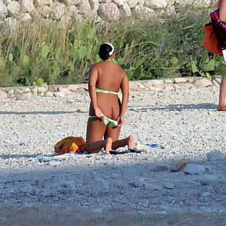 Naturist Teen Girls Enjoying Being Naked on Nude Beach to Let Their Tittles get some Sun's Warmth an